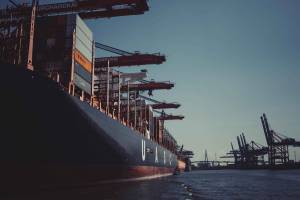 ship on port 300x200 - Top 3 Benefits of Supply Chain Management